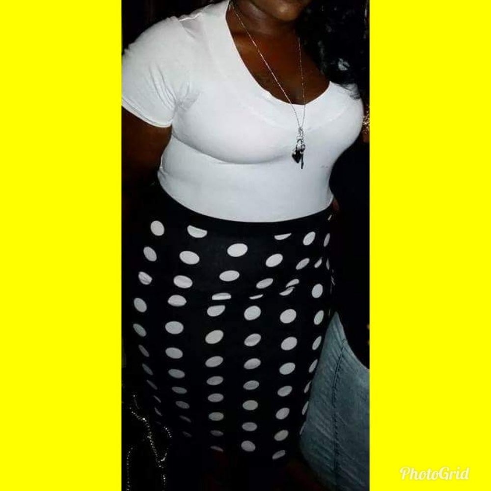 Black/White Polkadot Skirt. Black color is a tiny faded.